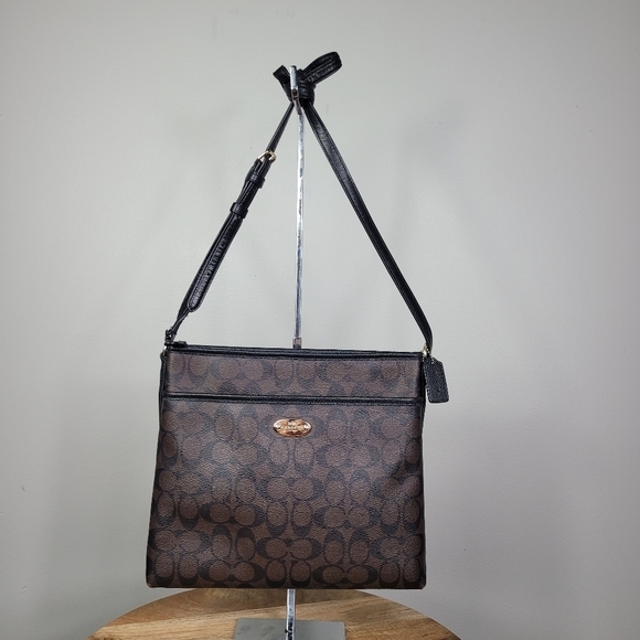 Coach Handbags - Coach New York Signature File Bag inCoated Canvas Crossbody